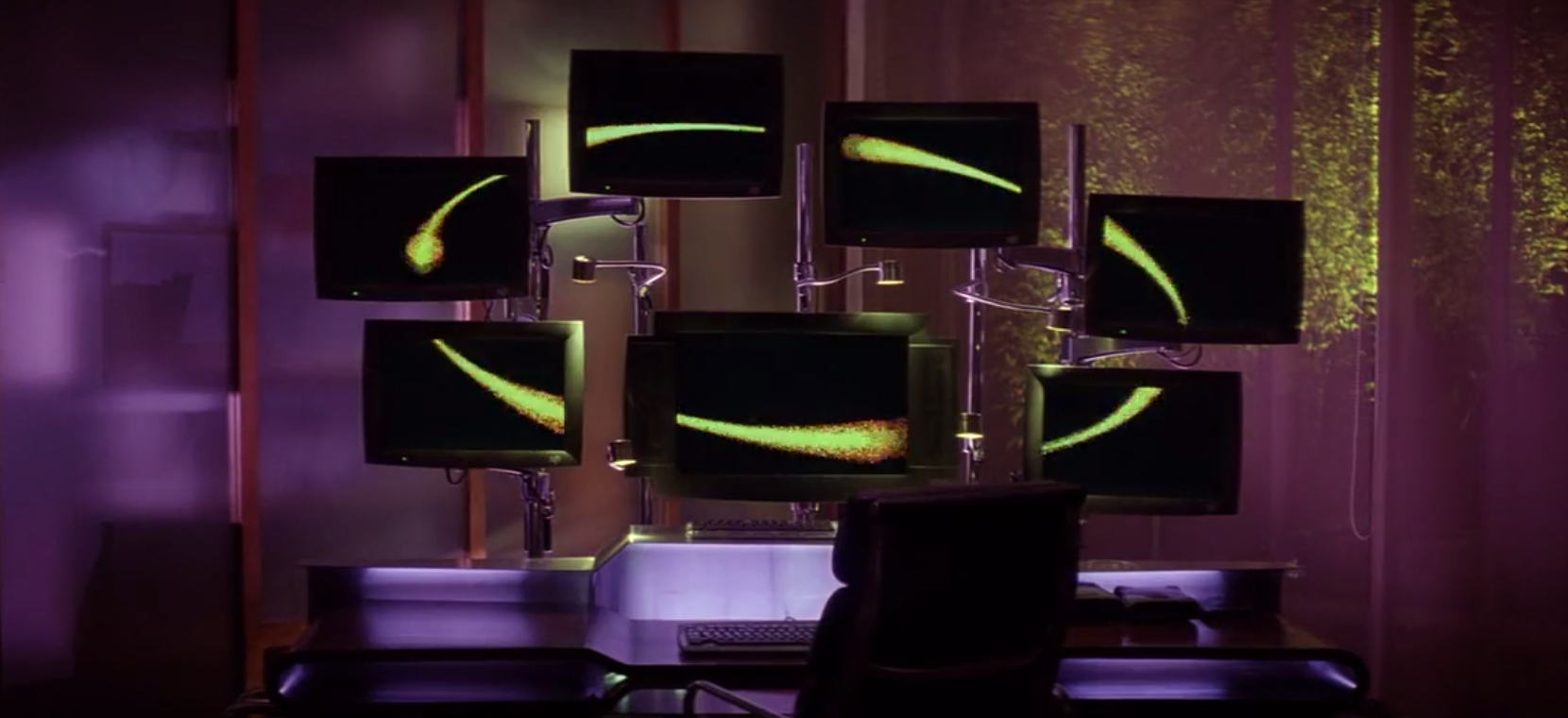 Some monitors on a desk